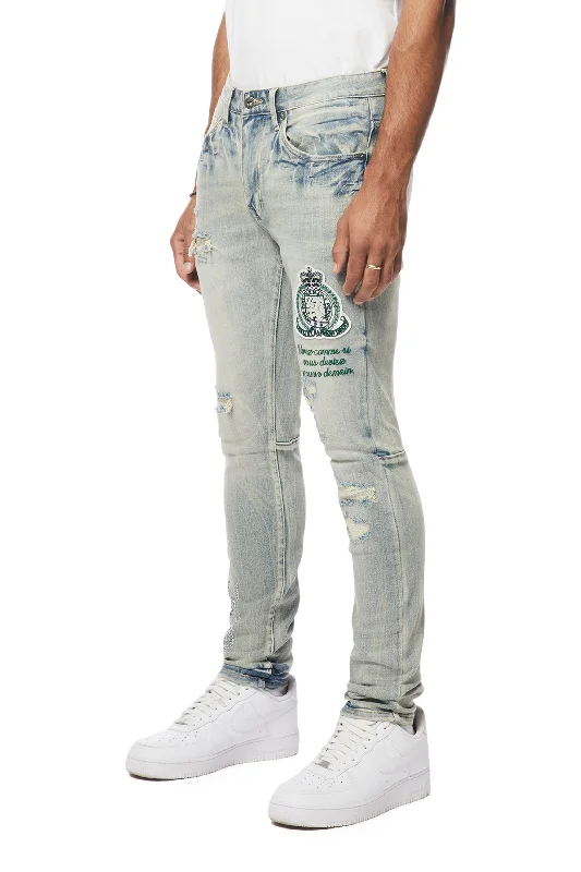 Preppy Crest Embroidered Slim Tapered Denim Jeans - Cascade Blue